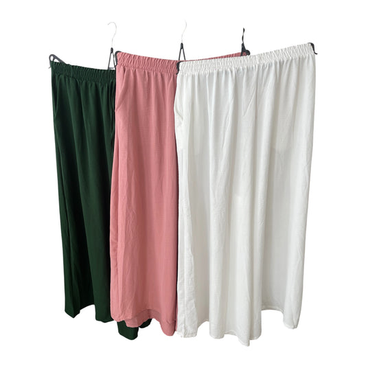 Pantalon fluide grande taille: 42-48. Disponible en: vert-vieux rose-blanc.